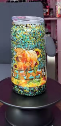 #37. 16 oz acrylic green and black with sunflowers