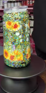 #37. 16 oz acrylic green and black with sunflowers