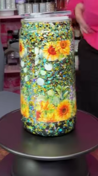 #37. 16 oz acrylic green and black with sunflowers