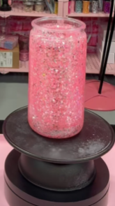 #110. 16 oz acrylic pink and sparkly