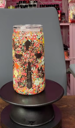 #39. 16 oz acrylic MC with flowers and cross