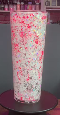 #60. 24 oz acrylic V-shape white and silver with pink lava