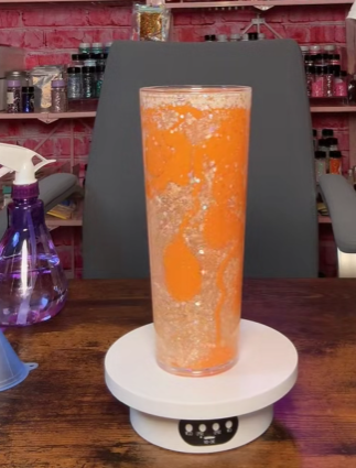 #7. 24 oz acrylic Orange Lava Flow tumbler